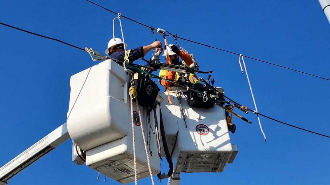 worker in cherrypicker