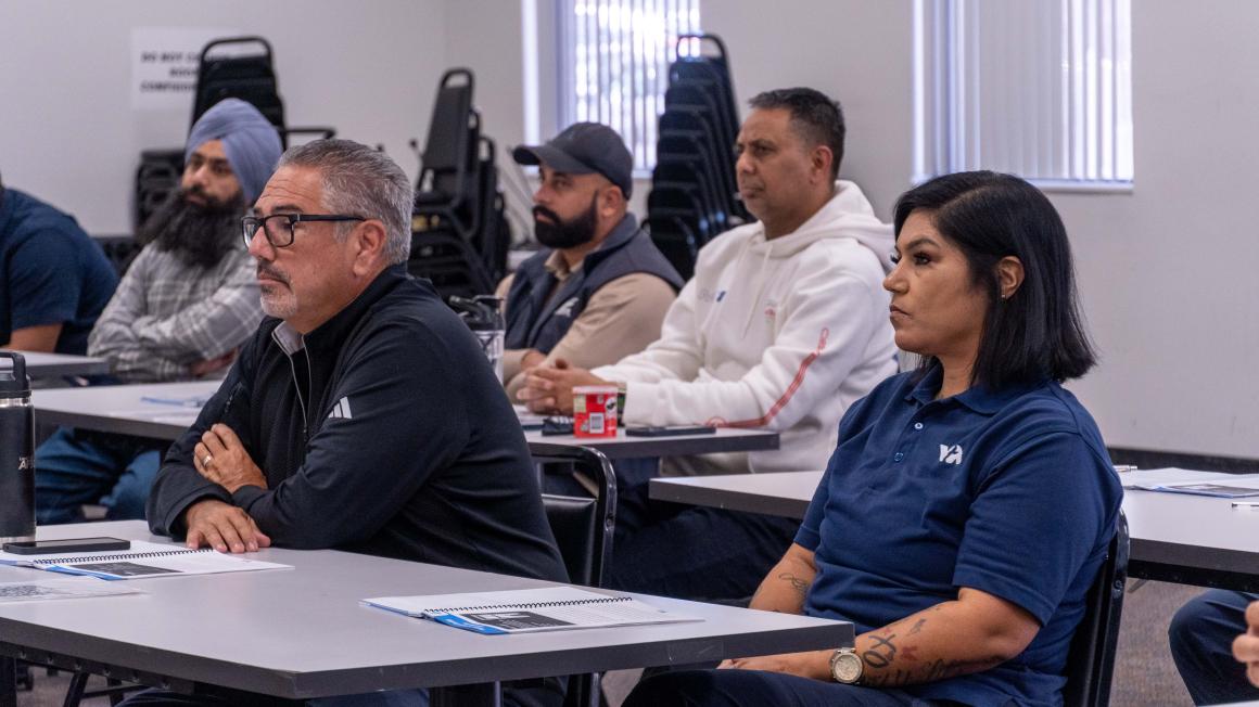 VTA staff listening to an instructor