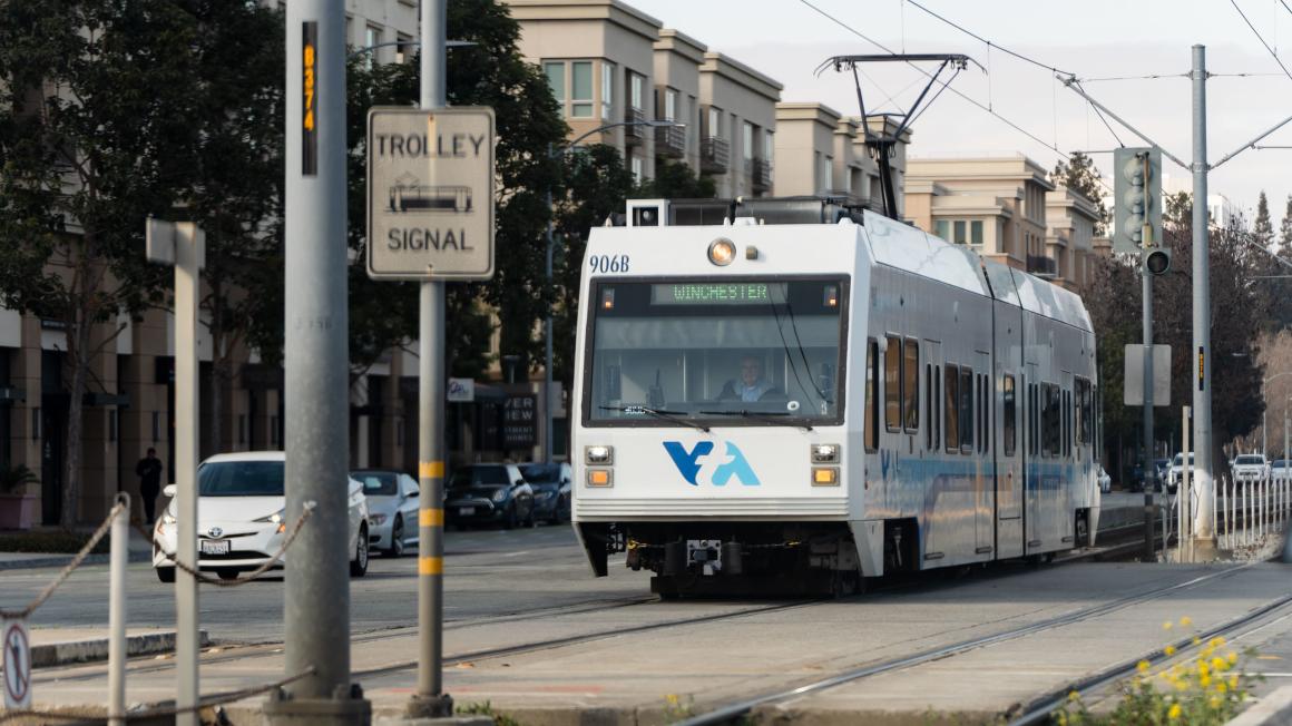 VTA light rail driving through a trolley crossing