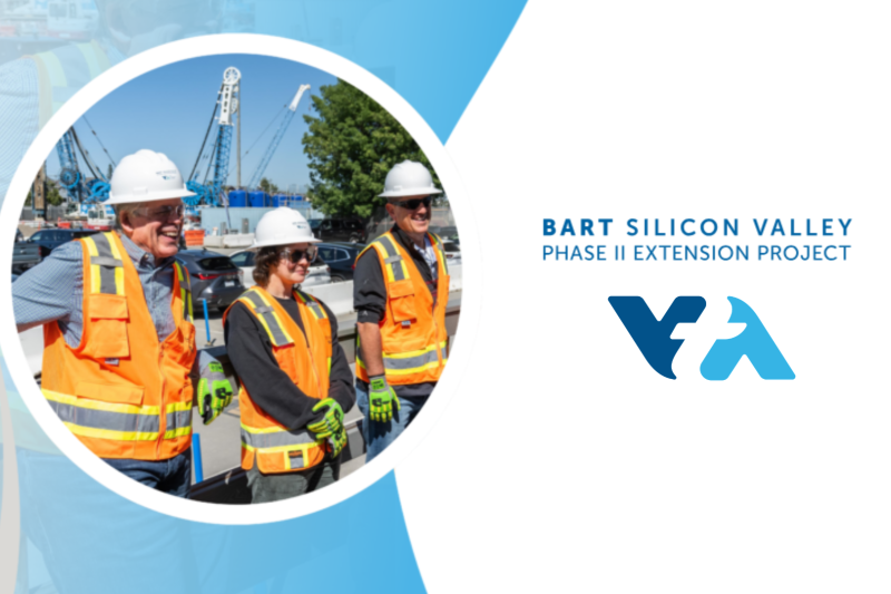 Three people wearing hard hats, safety vests, and work gloves stand at the BART Silicon Valley Phase II Extension Project construction site with cranes in the background. The image includes the project name and VTA logo.