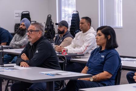 VTA staff listening to an instructor