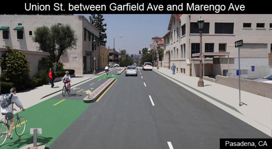 S2C9.7G3_revisingLOS_CaseStudy3_Pasadena Graphic of an artists rendering of a redesigned roadway with a two-way separated bikeway on the left side and two-lane roadway on the right with buildings on either side and people walking and biking