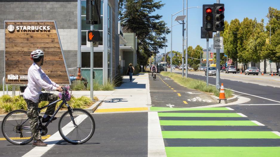 S1C2.8G8-SanPabloAve-Albany-SergioRuiz.jpg A photo of a two separated bike path next to a starbucks.