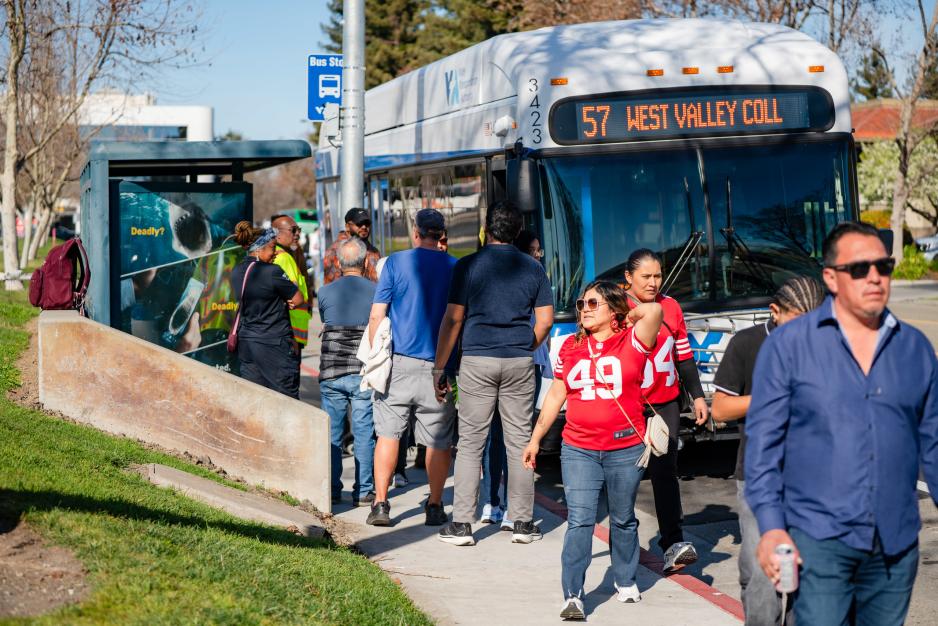 passengers boarding a vta bus