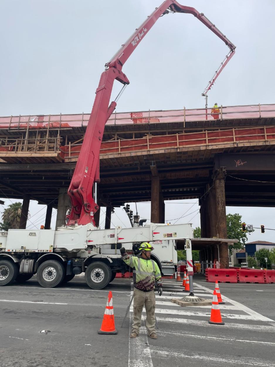 construction worker and equipment on the street